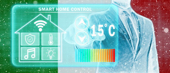 Frozen citizen of Italy adjusting heating temperature on a virtual screen of smart home controller, winter blizzard. Concept of forced thrift, energy war and increased price for natural gas