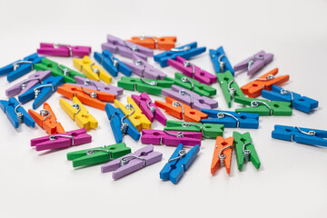 group of colorful clothespins isolated on white background