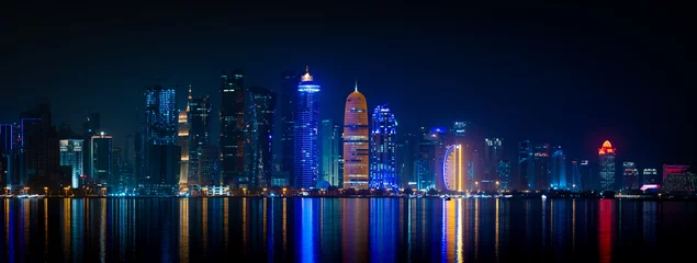 Rucksack Doha skyline with many towers during the night. © MSM