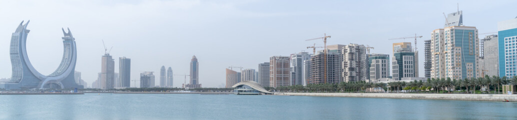 Fototapeta na wymiar The new developing city Lusail with many new towers under construction.
