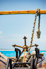 Zanzibar dhow in the sea, anchor on the boat at Matemwe, Zanzibar, Tanzania - obrazy, fototapety, plakaty