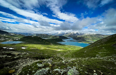 Fototapeta na wymiar View from the mountain Bitihorn over the valley in Jotunheimen National Park, Norway