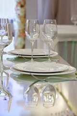 Two wedding glasses for champagne or wine. The concept of drinks and the wedding table layout.