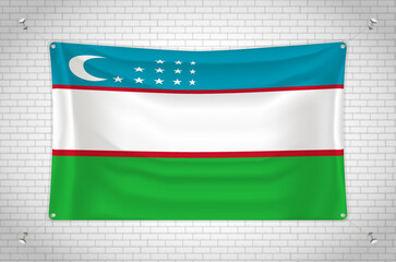 Uzbekistan flag hanging on brick wall. 3D drawing. Flag attached to the wall. Neatly drawing in groups on separate layers for easy editing.