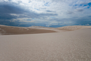 Lençóis Maranhenses sand dunes and blue sky with clouds