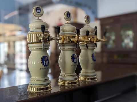 Rikoti, Georgia, May, 27, 2022: Hofbrau beer pumps or taps inside a restaurant, selective focus