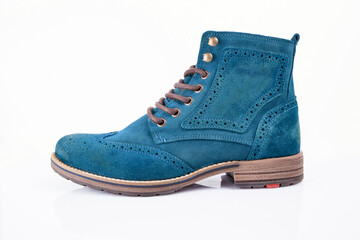 Male blue leather boot on white background, isolated product. Differentiated footwear and exclusive design.