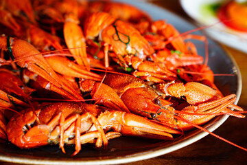an appetizer with beer from whole boiled river crayfish.