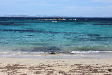 Fototapeta na wymiar a sunny day on a beach holiday in the Balearic islands
