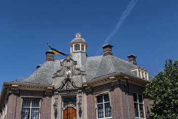 Zandvoort town hall is one of the most striking old buildings in the town. Zandvoort town hall facade using sandstone and decorations in Louis XV style. Zandvoort, The Netherlands. - obrazy, fototapety, plakaty