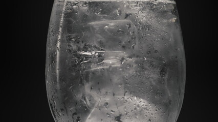 Ice cubes cold water glass closeup. Refreshing tonic concept - obrazy, fototapety, plakaty
