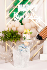 Drink in front of marijuana themed birthday party 