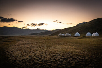 sunrise over the mountains, yurt camp, near song-köl lake, kyrgyzstan, central asia