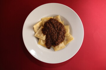 italian ravioli bolognese dish close up top view