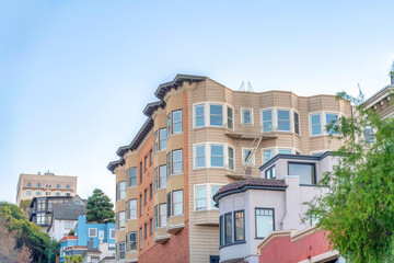 Low-rise residential buildings on a sloped suburbs of San Francisco, CA