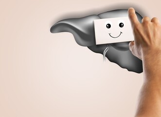 A happy face icon on liver. A symbol of a healthy, protected from liver diseases