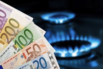 The banknotes with burning gas burner. The concept is to increase the cost of supply. The energy...
