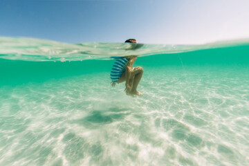 A girl floating in clear water
