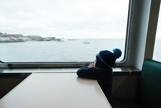 Boy watches the world go by