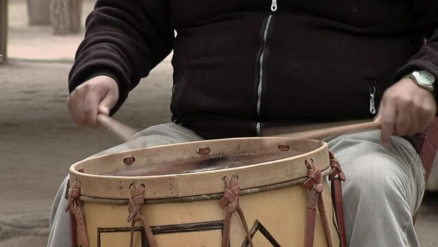 Man Playing Traditional Bombo Leguero Drum in Santiago del Estero, Argentina. Close Up.