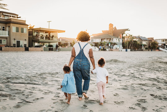 Mother and daughters at beach