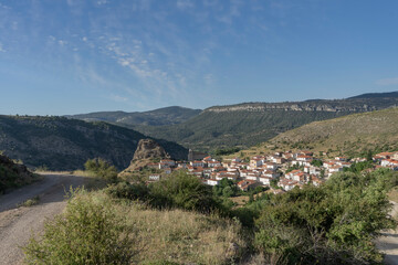 Fototapeta na wymiar Viewpoint in the village of Huelamo surrounded by nature and mountains on a summer day. Spain