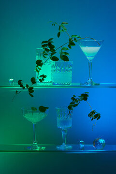 different alcohol drinks set on bright background