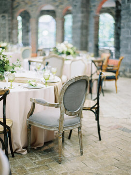 Wooden chair in wedding reception hall