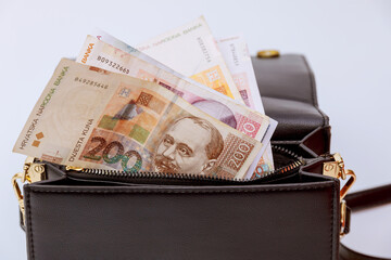 Kunas, Croatian money in a purse on a white background.
