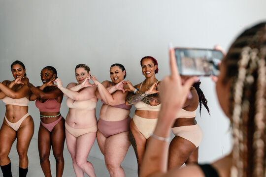 Girl photographs women