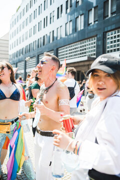 Friends hanging out on the street during Pride