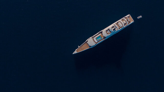 aerial View Of a super yacht with swimming pool on the deck
