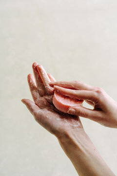 Female hands with soap 