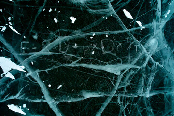 Greenland Arctic sea ice - climate emergency formula written in snow