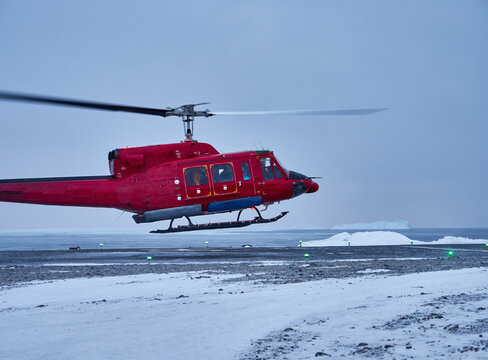 Greenland in winter - helicopter air transport for travel and tourism