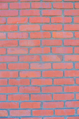 Fototapeta premium Red bricks close-up with running bond pattern in San Francisco, California