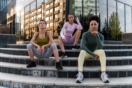 Multiracial sportswomen during city workout