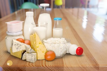 Fototapeta na wymiar Fresh dairy products milk, kefir, feta, cottage cheese. Symbols of jewish holiday - Shavuot.