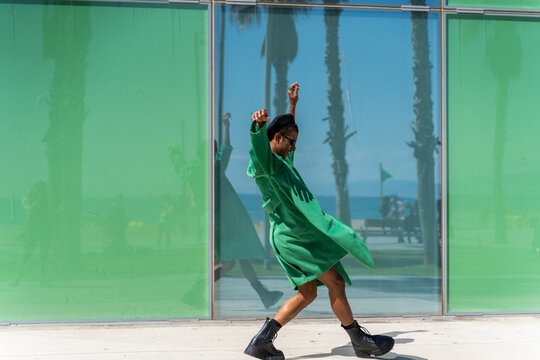 Cool black man dancing in coast town