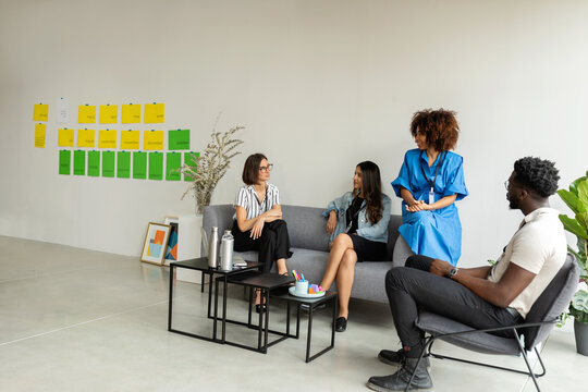 Business group relaxing at cowork office