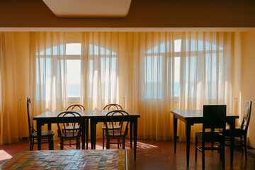 Empty dining room in hotel with warm light