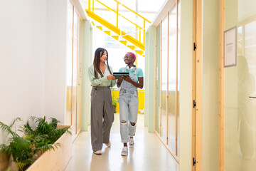 Two colleagues in a modern office
