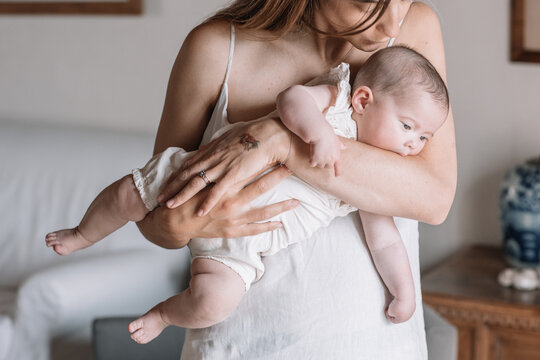 Mother Holding Her Daughter