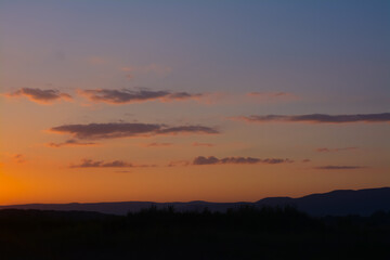 Picturesque view of beautiful field at sunset