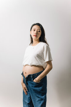 Portrait of a pregnant Asian woman