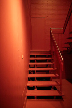 Stairwell Lit With Orange Lights