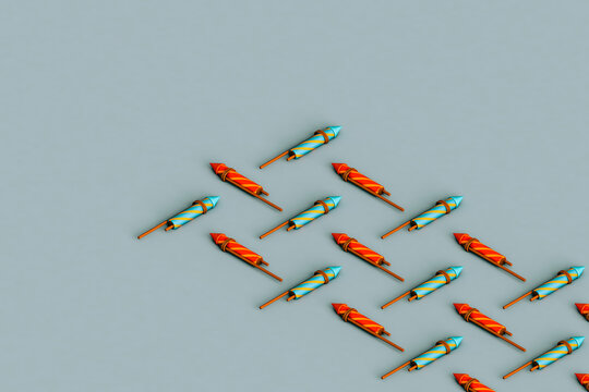 rows of fireworks rockets on blue background