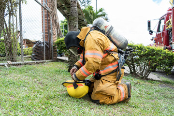 Firefighter preparing equipment