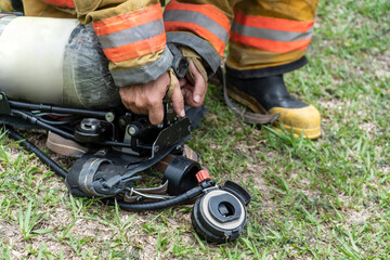 unrecognizable firefighter