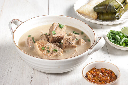 Coto Makasar is Indonesian traditional food from Makasar, Sulawesi, served with Buras.